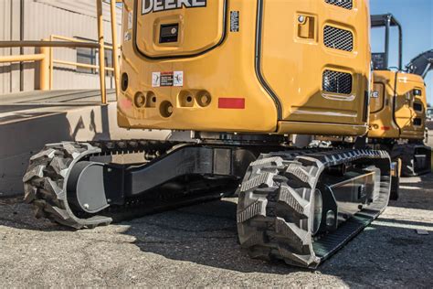 skid steer steel tracks vs rubber tracks|aftermarket rubber equipment tracks.